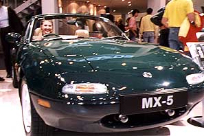 Britta in the green Miata